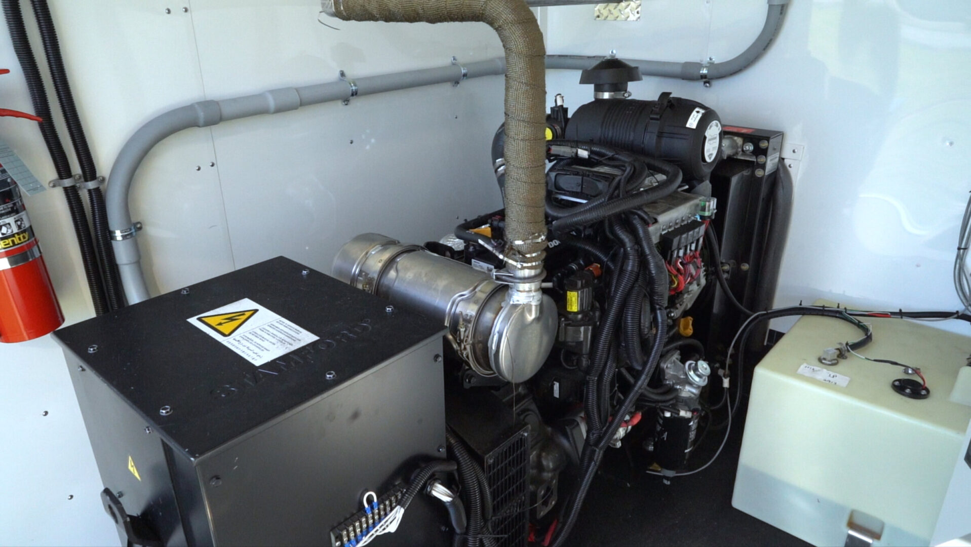 Inside an ArmorThane Mobile Coatings Unit with spray equipment