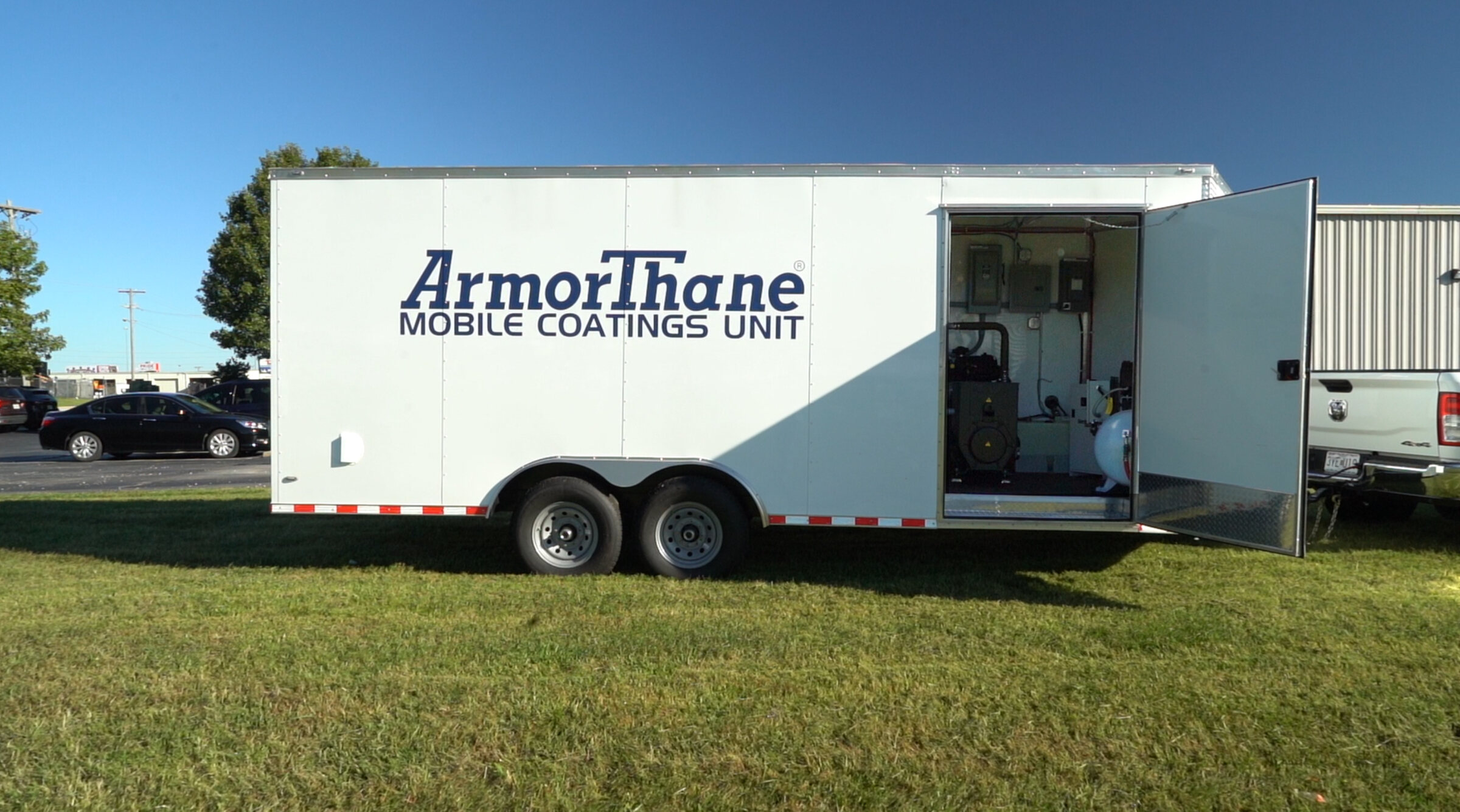 ArmorThane Mobile Coatings Unit trailer hitched to a pickup