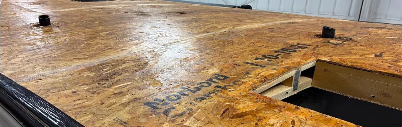 Exposed RV roof decking during a roof rebuild